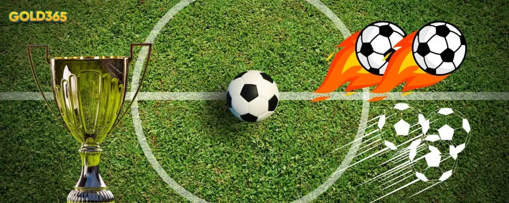 Soccer trophy and ball placed on green grass, representing football tournament betting on Gold365Play.